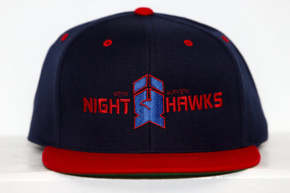 New Haven Nighthawks snapback hat with navy blue crown and red brim featuring team logo embroidery on front panel