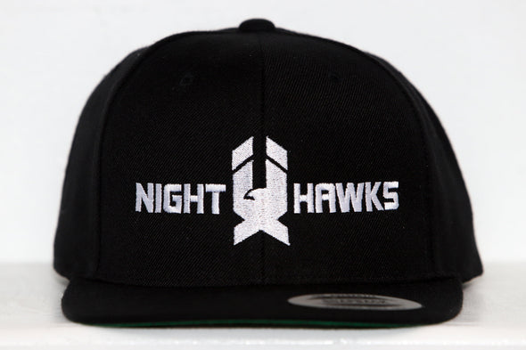 Black snapback hat with white embroidered New Haven Nighthawks logo and text on front panel
