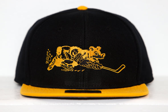 Cape Cod Cubs Hat (Snapback) in black and yellow with vintage hockey team mascot embroidered on front panel