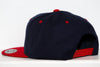 Black and red Amarillo Wranglers structured snapback hat with flat brim and adjustable closure shown from the side and back.