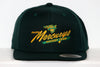 Dark green snapback hat with yellow Toledo Mercurys hockey team logo and vintage airplane embroidery on front panel.