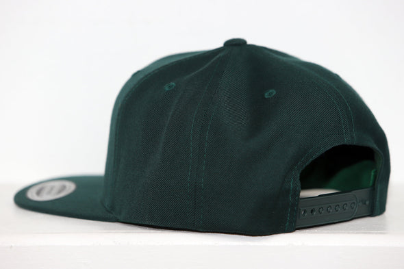 Dark green snapback hat for Plattsburgh Pioneers with adjustable strap and flat brim visible from the back angle