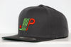 Black snapback hat with green and red Plattsburgh Pioneers logo embroidered on the front panel