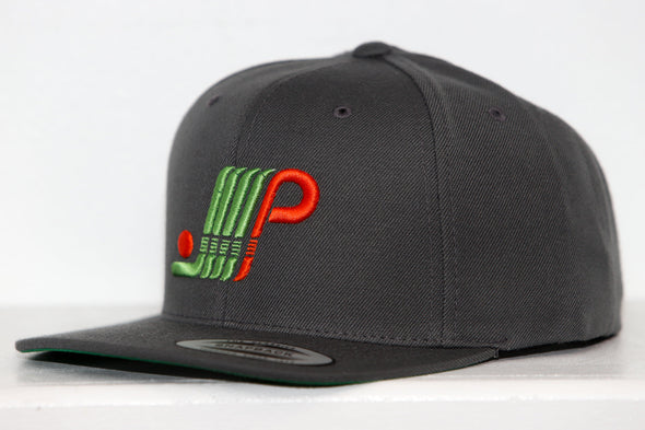 Black snapback hat with green and red Plattsburgh Pioneers logo embroidered on the front panel