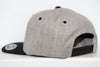 Columbus Chill Hat (Snapback) in heather grey with black adjustable strap and flat brim, shown from back angle