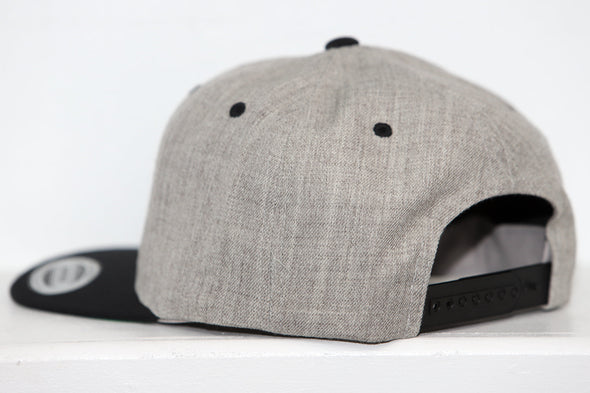 Columbus Chill Hat (Snapback) in heather grey with black adjustable strap and flat brim, shown from back angle
