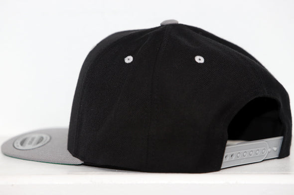 Columbus Chill Hat (Snapback) in black and gray with adjustable snap closure and classic retro design