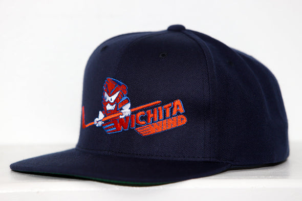 Navy blue snapback hat featuring the Wichita Wind logo with an angry tornado holding a hockey stick in purple and orange.