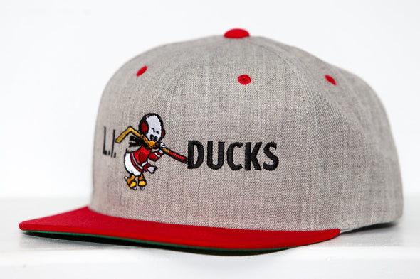 Long Island Ducks snapback hat with team mascot and logo in red and gray colors, branded sportswear accessory
