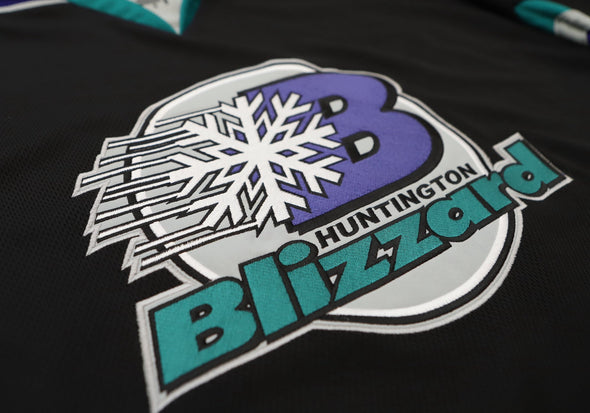Huntington Blizzard™ Black Jersey (CUSTOM - PRE-ORDER) with retro snowflake logo on black mesh fabric front panel
