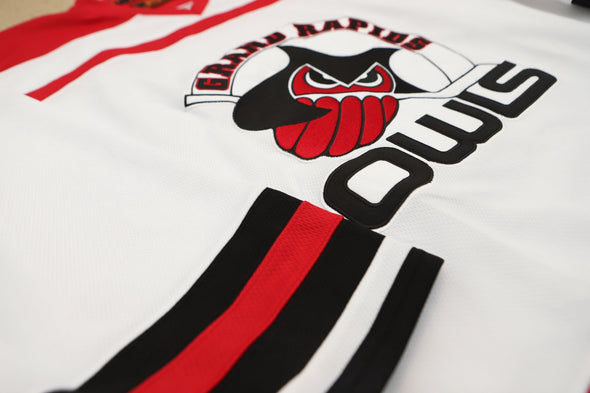 Grand Rapids Owls™ Modern White Jersey (BLANK) with vintage hockey owl logo and red and black striped sleeve detail
