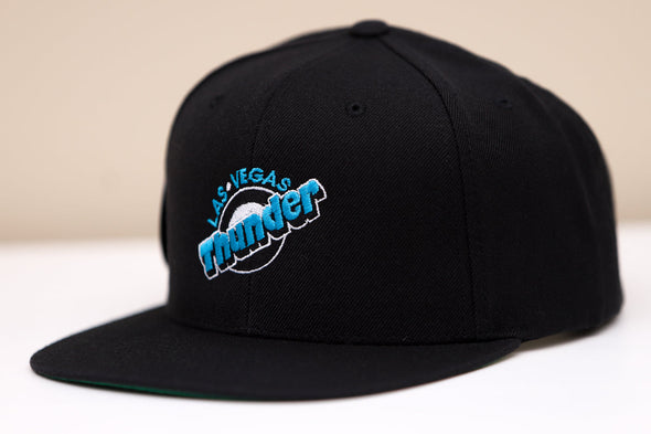 Black snapback hat featuring blue and white Las Vegas Thunder logo embroidery on front panel