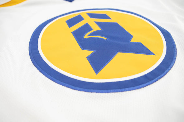 New Haven Nighthawks 1970s Jersey (BLANK) in white with blue and yellow retro hockey logo patch close-up