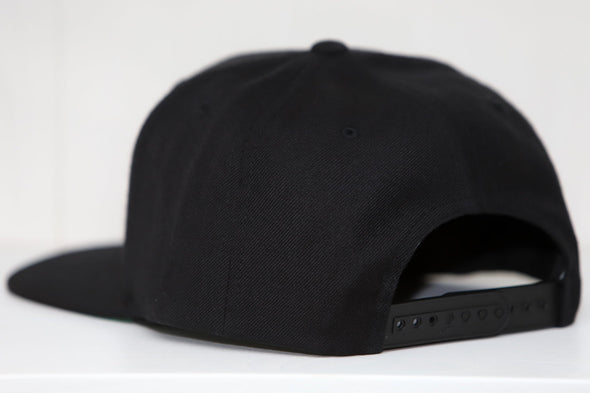 Wyoming Outlaws Hat (Snapback) in black with adjustable snapback closure shown from rear angle