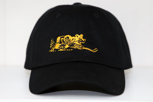 Cape Cod Cubs Hat in black with vintage yellow bear playing hockey embroidered on front panel